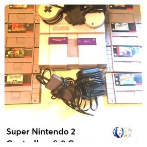 Super Nintendo with 2 Controllers & 8 Games